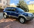 Синий Хендай Туксон, объемом двигателя 2 л и пробегом 168 тыс. км за 7500 $, фото 1 на Automoto.ua