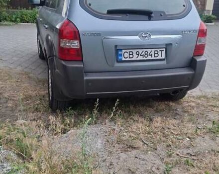 Синий Хендай Туксон, объемом двигателя 1.98 л и пробегом 310 тыс. км за 8200 $, фото 5 на Automoto.ua