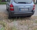 Синий Хендай Туксон, объемом двигателя 1.98 л и пробегом 310 тыс. км за 8200 $, фото 5 на Automoto.ua