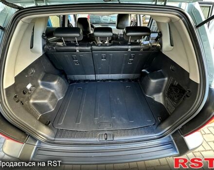 Синий Хендай Туксон, объемом двигателя 2 л и пробегом 233 тыс. км за 8300 $, фото 10 на Automoto.ua