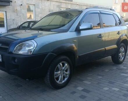 Синий Хендай Туксон, объемом двигателя 1.98 л и пробегом 183 тыс. км за 6700 $, фото 8 на Automoto.ua