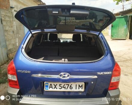 Синий Хендай Туксон, объемом двигателя 2 л и пробегом 200 тыс. км за 7600 $, фото 7 на Automoto.ua