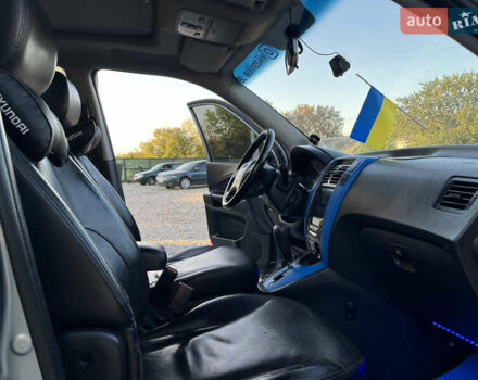 Синий Хендай Туксон, объемом двигателя 2 л и пробегом 317 тыс. км за 9600 $, фото 18 на Automoto.ua