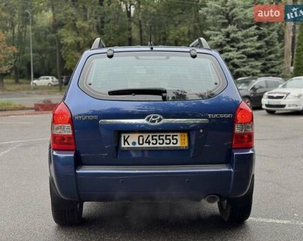 Синий Хендай Туксон, объемом двигателя 1.98 л и пробегом 178 тыс. км за 8999 $, фото 12 на Automoto.ua