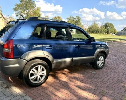 Синий Хендай Туксон, объемом двигателя 2 л и пробегом 168 тыс. км за 7500 $, фото 1 на Automoto.ua