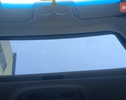 Синий Хендай Туксон, объемом двигателя 1.98 л и пробегом 183 тыс. км за 6700 $, фото 12 на Automoto.ua