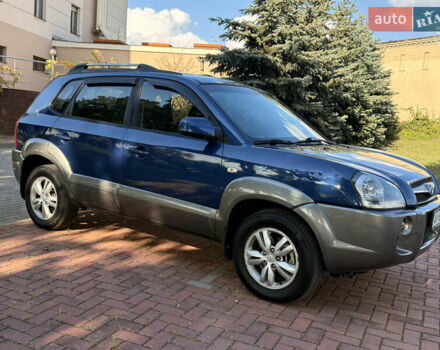 Синий Хендай Туксон, объемом двигателя 2 л и пробегом 168 тыс. км за 6900 $, фото 3 на Automoto.ua