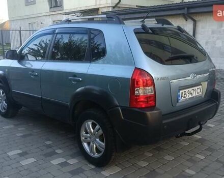 Синий Хендай Туксон, объемом двигателя 1.98 л и пробегом 183 тыс. км за 6700 $, фото 4 на Automoto.ua