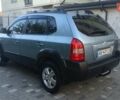 Синий Хендай Туксон, объемом двигателя 1.98 л и пробегом 183 тыс. км за 6700 $, фото 4 на Automoto.ua