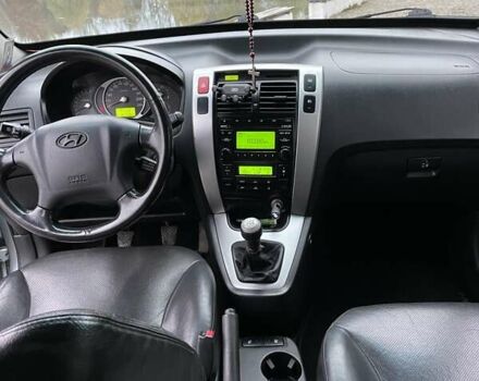 Синий Хендай Туксон, объемом двигателя 1.98 л и пробегом 168 тыс. км за 8500 $, фото 5 на Automoto.ua