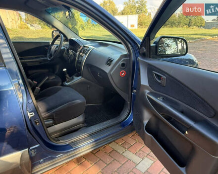 Синий Хендай Туксон, объемом двигателя 2 л и пробегом 168 тыс. км за 6900 $, фото 2 на Automoto.ua