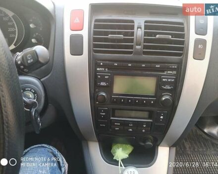 Синий Хендай Туксон, объемом двигателя 2 л и пробегом 200 тыс. км за 7600 $, фото 9 на Automoto.ua