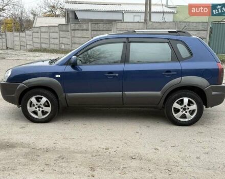 Синий Хендай Туксон, объемом двигателя 2 л и пробегом 270 тыс. км за 6250 $, фото 6 на Automoto.ua