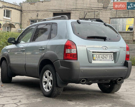 Синий Хендай Туксон, объемом двигателя 2.7 л и пробегом 220 тыс. км за 7900 $, фото 3 на Automoto.ua