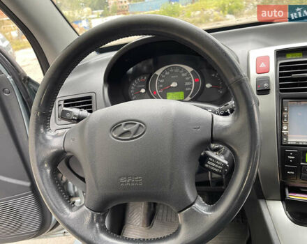 Синий Хендай Туксон, объемом двигателя 2.7 л и пробегом 220 тыс. км за 7900 $, фото 13 на Automoto.ua