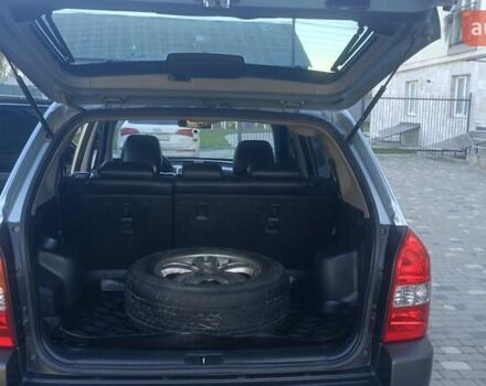 Синий Хендай Туксон, объемом двигателя 1.98 л и пробегом 183 тыс. км за 6700 $, фото 18 на Automoto.ua