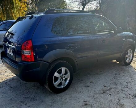 Синий Хендай Туксон, объемом двигателя 2 л и пробегом 208 тыс. км за 6700 $, фото 6 на Automoto.ua