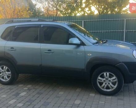 Синий Хендай Туксон, объемом двигателя 1.98 л и пробегом 183 тыс. км за 6700 $, фото 1 на Automoto.ua