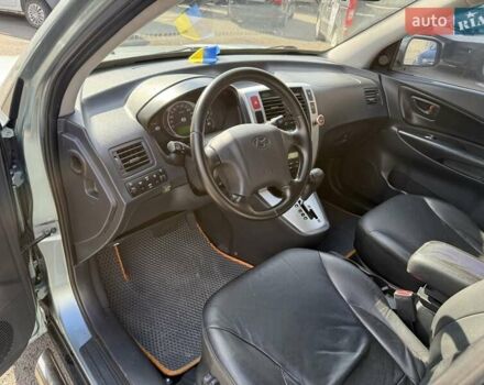 Синий Хендай Туксон, объемом двигателя 1.98 л и пробегом 219 тыс. км за 8500 $, фото 10 на Automoto.ua