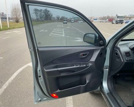 Синий Хендай Туксон, объемом двигателя 2 л и пробегом 179 тыс. км за 6500 $, фото 7 на Automoto.ua