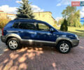 Синий Хендай Туксон, объемом двигателя 2 л и пробегом 168 тыс. км за 7500 $, фото 2 на Automoto.ua