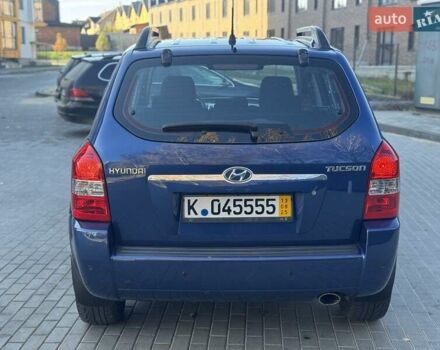 Синий Хендай Туксон, объемом двигателя 1.98 л и пробегом 178 тыс. км за 8700 $, фото 15 на Automoto.ua