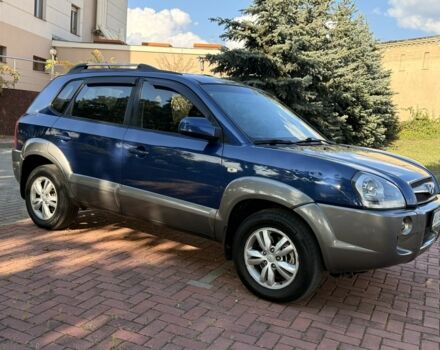 Синий Хендай Туксон, объемом двигателя 2 л и пробегом 168 тыс. км за 7500 $, фото 5 на Automoto.ua