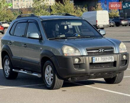 Синий Хендай Туксон, объемом двигателя 1.98 л и пробегом 219 тыс. км за 8500 $, фото 6 на Automoto.ua
