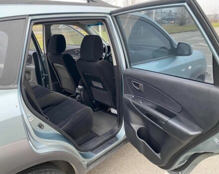 Синий Хендай Туксон, объемом двигателя 2 л и пробегом 179 тыс. км за 6500 $, фото 11 на Automoto.ua