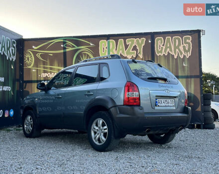 Синий Хендай Туксон, объемом двигателя 2 л и пробегом 317 тыс. км за 9600 $, фото 7 на Automoto.ua