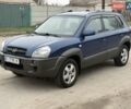 Синий Хендай Туксон, объемом двигателя 2 л и пробегом 270 тыс. км за 6250 $, фото 2 на Automoto.ua