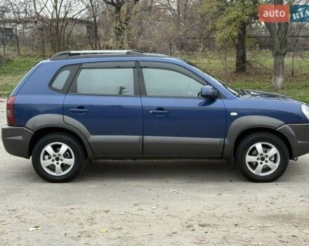 Синий Хендай Туксон, объемом двигателя 2 л и пробегом 270 тыс. км за 6250 $, фото 7 на Automoto.ua