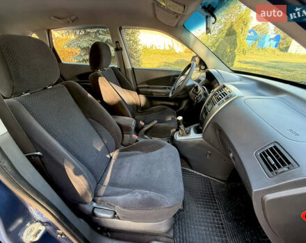 Синий Хендай Туксон, объемом двигателя 2 л и пробегом 168 тыс. км за 6900 $, фото 11 на Automoto.ua