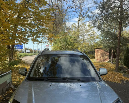 Синий Хендай Туксон, объемом двигателя 1.98 л и пробегом 200 тыс. км за 7700 $, фото 2 на Automoto.ua