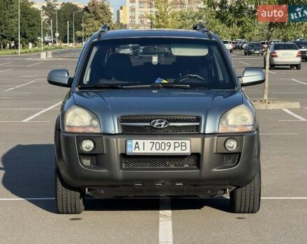 Синий Хендай Туксон, объемом двигателя 1.98 л и пробегом 219 тыс. км за 8500 $, фото 7 на Automoto.ua