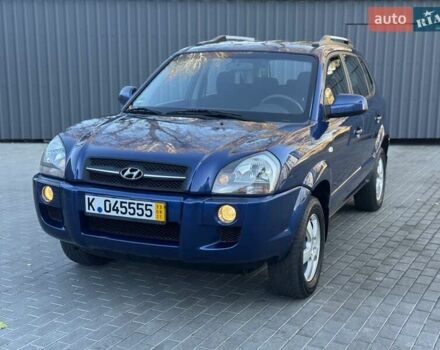 Синий Хендай Туксон, объемом двигателя 1.98 л и пробегом 178 тыс. км за 8700 $, фото 4 на Automoto.ua