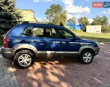 Синий Хендай Туксон, объемом двигателя 2 л и пробегом 168 тыс. км за 7500 $, фото 3 на Automoto.ua