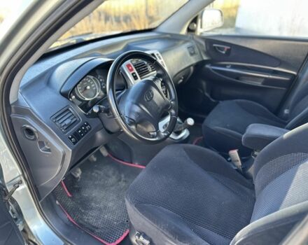 Синий Хендай Туксон, объемом двигателя 2 л и пробегом 187 тыс. км за 8200 $, фото 4 на Automoto.ua