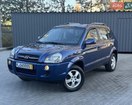 Синий Хендай Туксон, объемом двигателя 1.98 л и пробегом 178 тыс. км за 8700 $, фото 2 на Automoto.ua