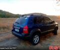 Синий Хендай Туксон, объемом двигателя 2 л и пробегом 220 тыс. км за 8500 $, фото 2 на Automoto.ua