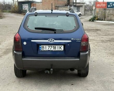 Синий Хендай Туксон, объемом двигателя 2 л и пробегом 270 тыс. км за 6250 $, фото 4 на Automoto.ua