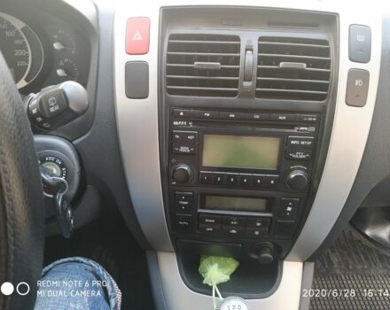 Синий Хендай Туксон, объемом двигателя 2 л и пробегом 200 тыс. км за 7600 $, фото 10 на Automoto.ua