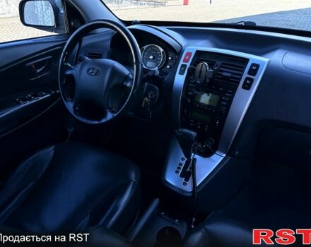 Хендай Туксон 2008 у Кременчуге на Automoto.ua Синій Хендай Туксон, об'ємом двигуна 2 л та пробігом 233 тис. км за 8300 $, фото 8 на Automoto.ua