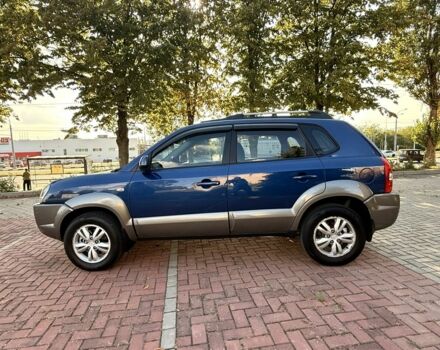 Синий Хендай Туксон, объемом двигателя 2 л и пробегом 168 тыс. км за 7500 $, фото 4 на Automoto.ua