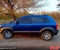 Синий Хендай Туксон, объемом двигателя 2 л и пробегом 220 тыс. км за 8500 $, фото 1 на Automoto.ua