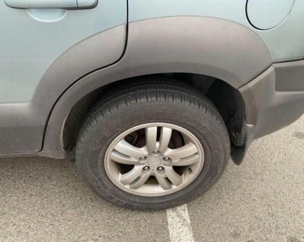 Синий Хендай Туксон, объемом двигателя 2 л и пробегом 179 тыс. км за 6500 $, фото 5 на Automoto.ua