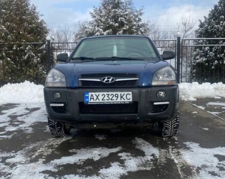 Синій Хендай Туксон, об'ємом двигуна 2 л та пробігом 172 тис. км за 8000 $, фото 3 на Automoto.ua