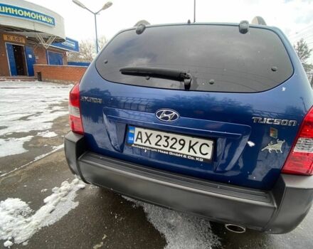 Синий Хендай Туксон, объемом двигателя 2 л и пробегом 170 тыс. км за 8500 $, фото 5 на Automoto.ua