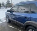 Синий Хендай Туксон, объемом двигателя 2 л и пробегом 170 тыс. км за 8500 $, фото 2 на Automoto.ua
