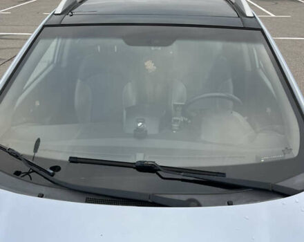 Синий Хендай Туксон, объемом двигателя 2.36 л и пробегом 286 тыс. км за 9800 $, фото 4 на Automoto.ua